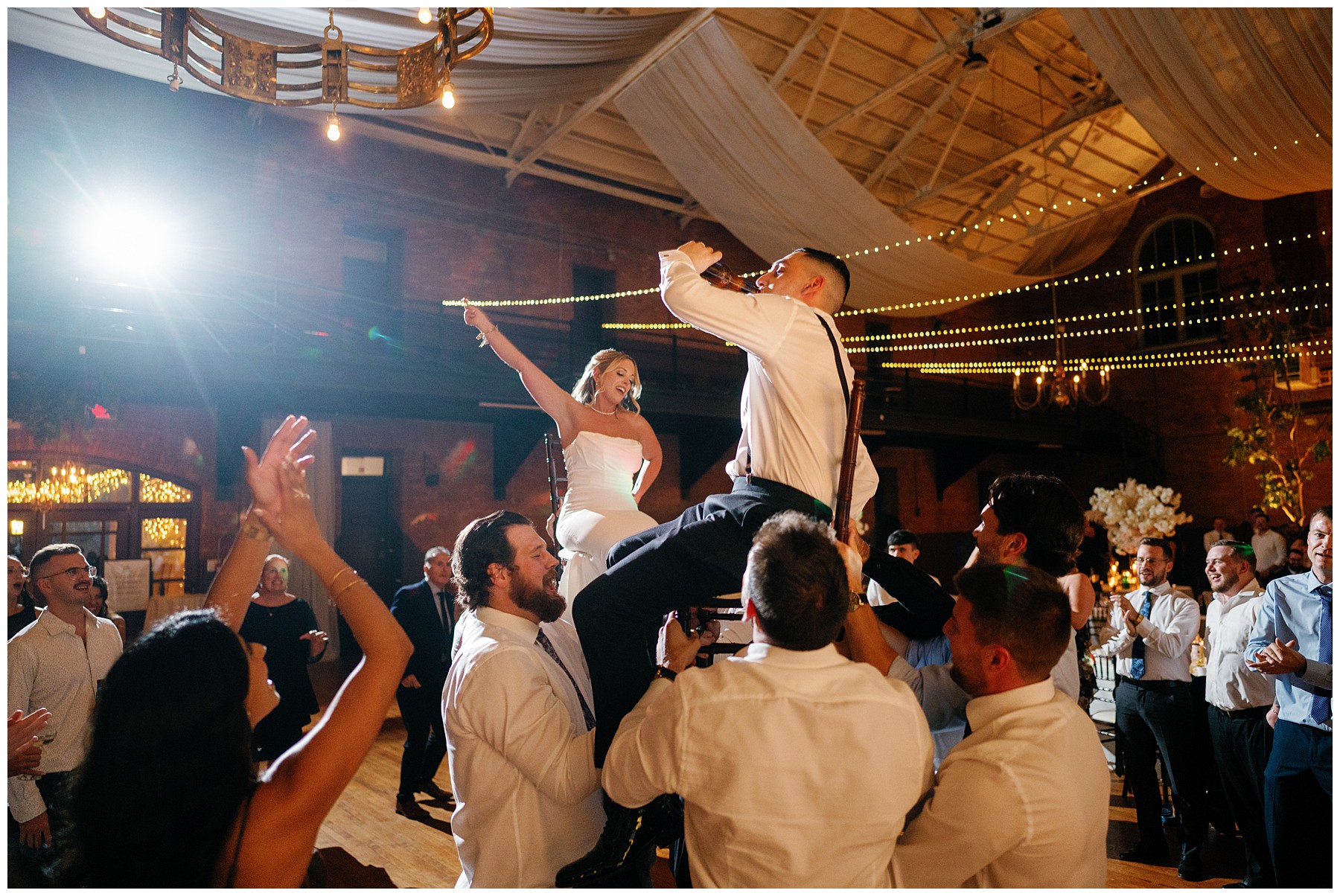 Chatham Armoury Wedding - Chatham, Ontario 34 Jenna and Isaac wedding at the Chatham Armoury — couple portrait inside the Armoury evening | John Lyons Photography